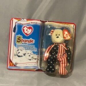 Conditions is ok it’s a 1999 Ty name spangle the bear has been opened
